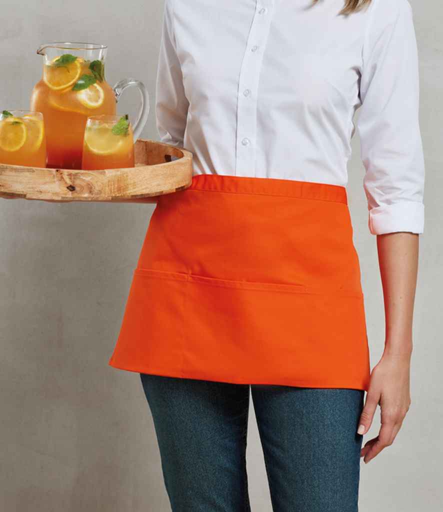 Premier PR155 Orange Model - Apron Ready to be Embroidered and Printed by Custard Workwear - Cheap Personalised and Customised Workwear in Nottinghamshire, Derbyshire and Leicestershire